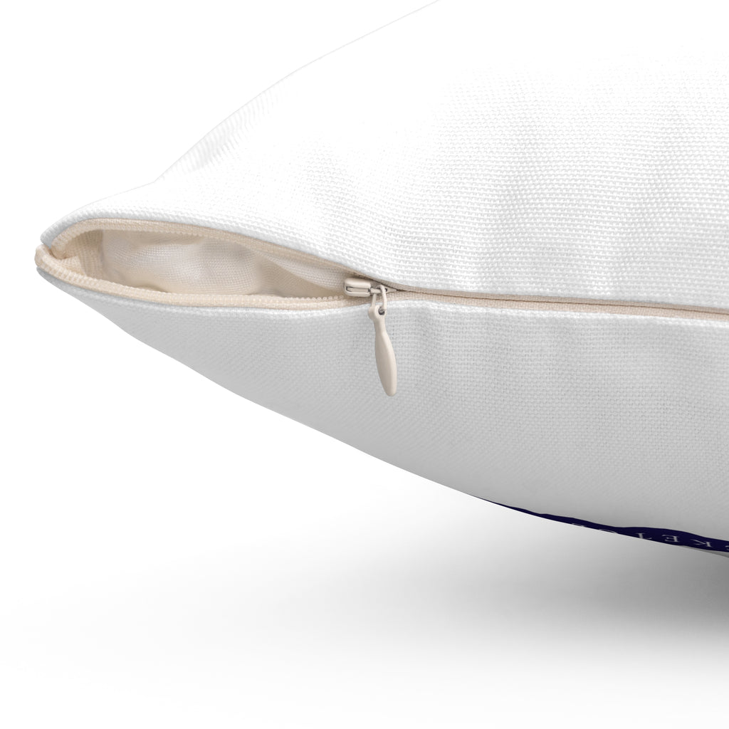 Close-up of a white pillow with a zipper on a white background
