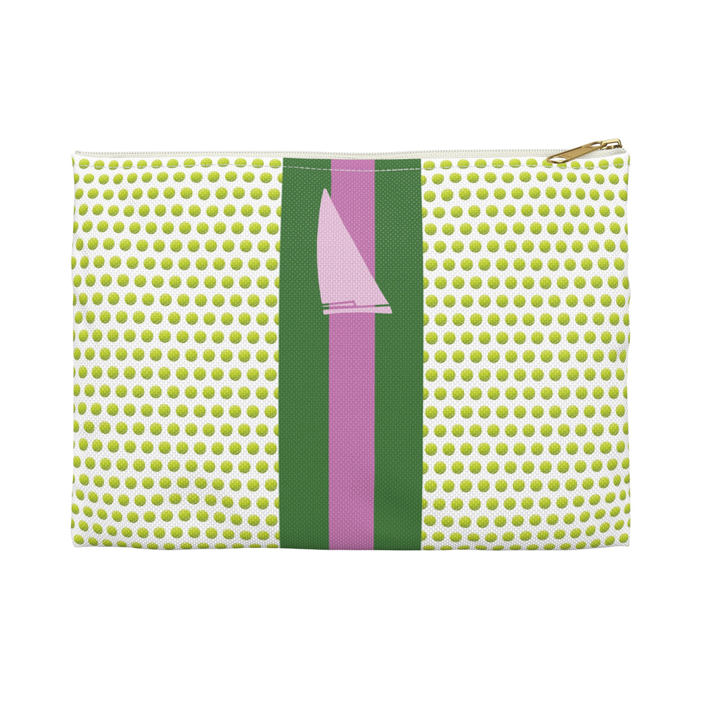 Pouch with green polka dot pattern and pink and green strap on a white background