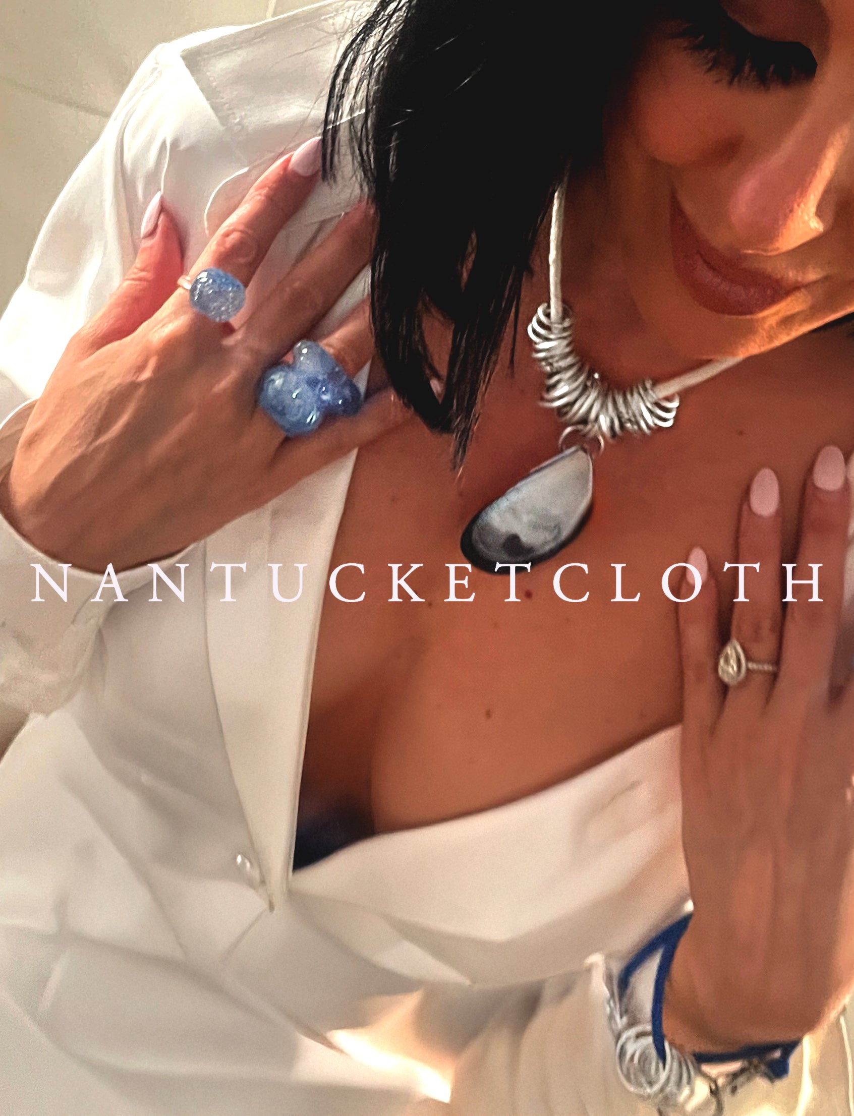 Newport Rhode Island Nantucketcloth White Nautical Rope With Hand Crafted Metal Rings Highlighting a Real Mussel Pendant Necklace.