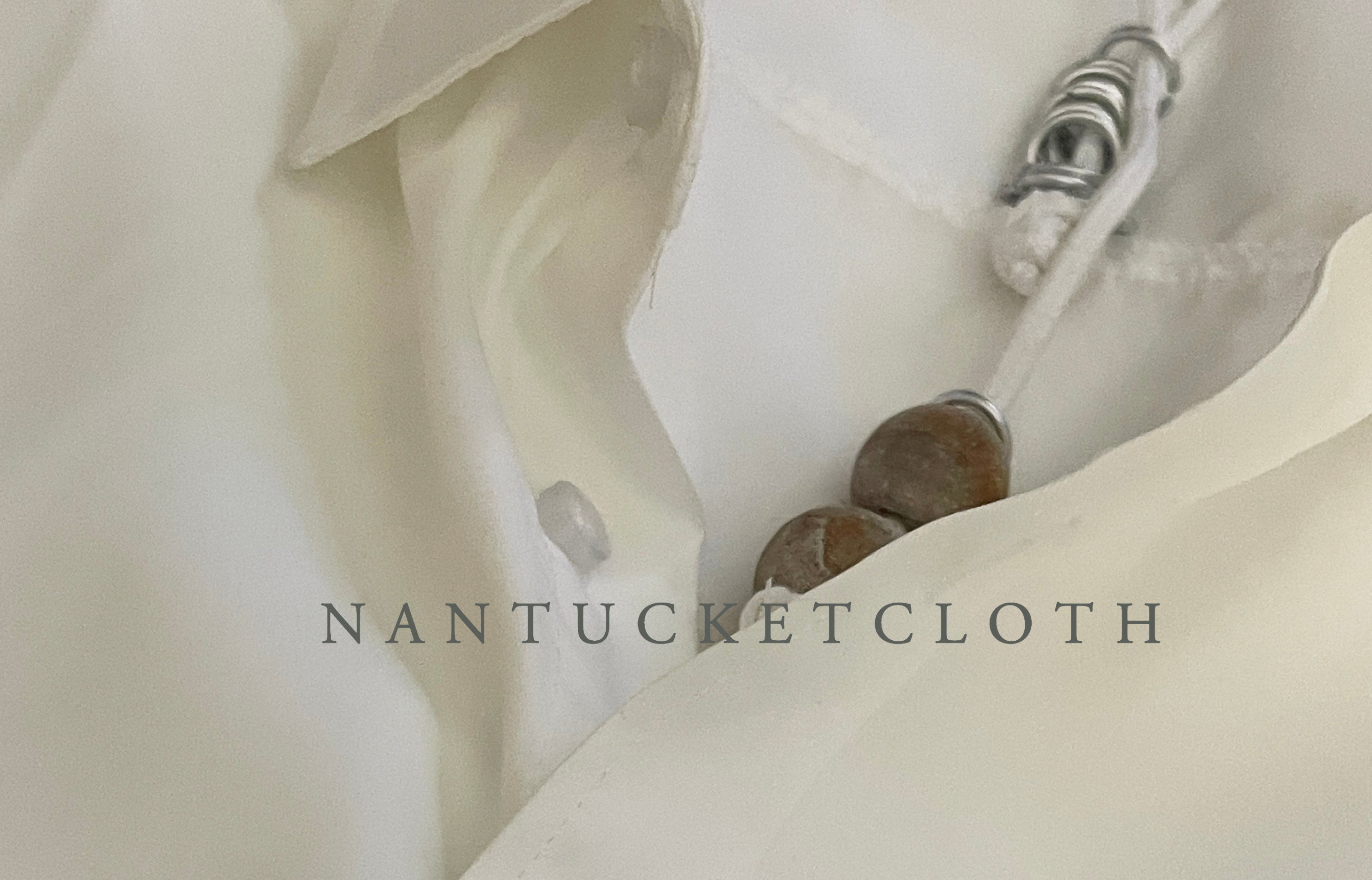 Newport Rhode Island Nantucketcloth White Nautical Rope With Hand Crafted Metal Rings Highlighting Beach wood crafted beads with a clip front Necklace.