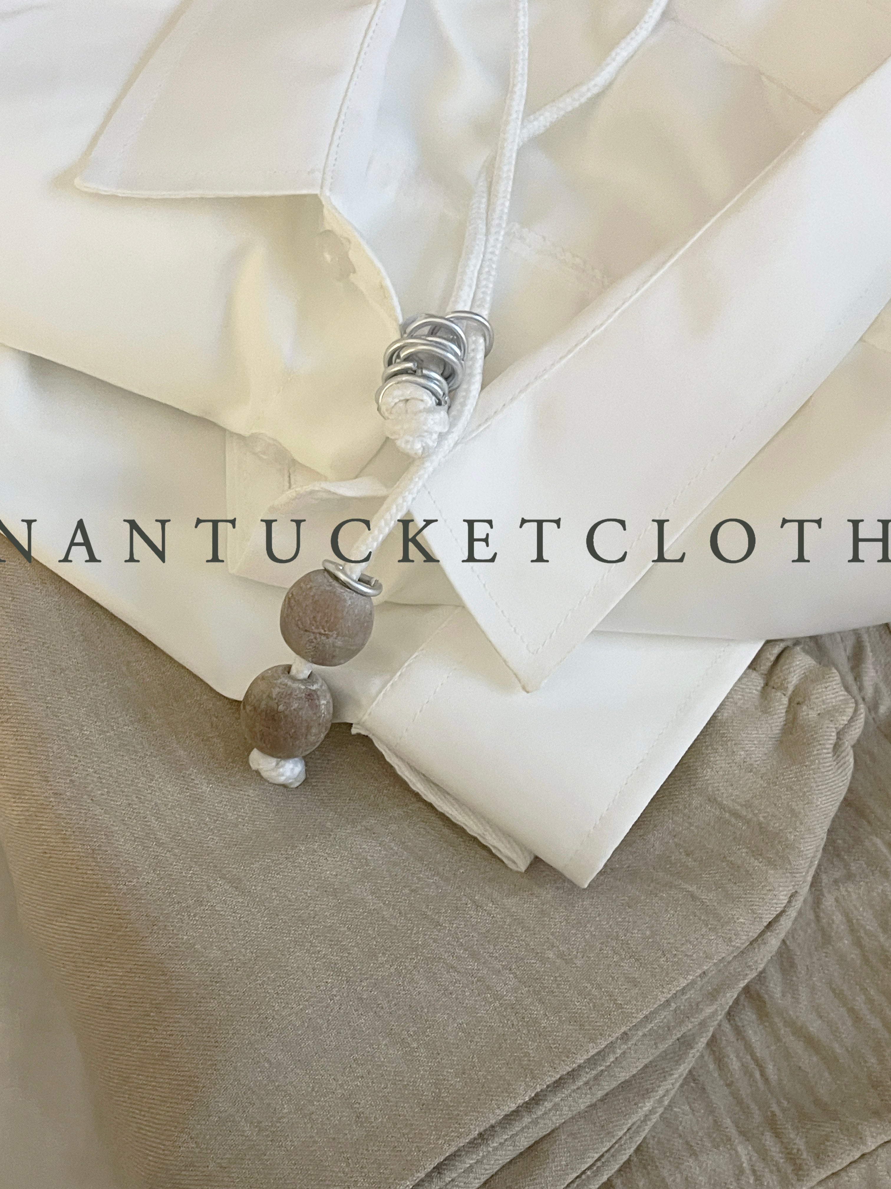 Newport Rhode Island Nantucketcloth White Nautical Rope With Hand Crafted Metal Rings Highlighting Beach wood crafted beads with a clip front Necklace.